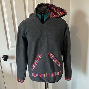 Hoodie from Guatemala. Local fabric detail to add color to a gray piece.